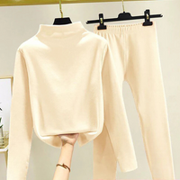 Two-piece women's winter set with fleece pullover and trousers – Eva