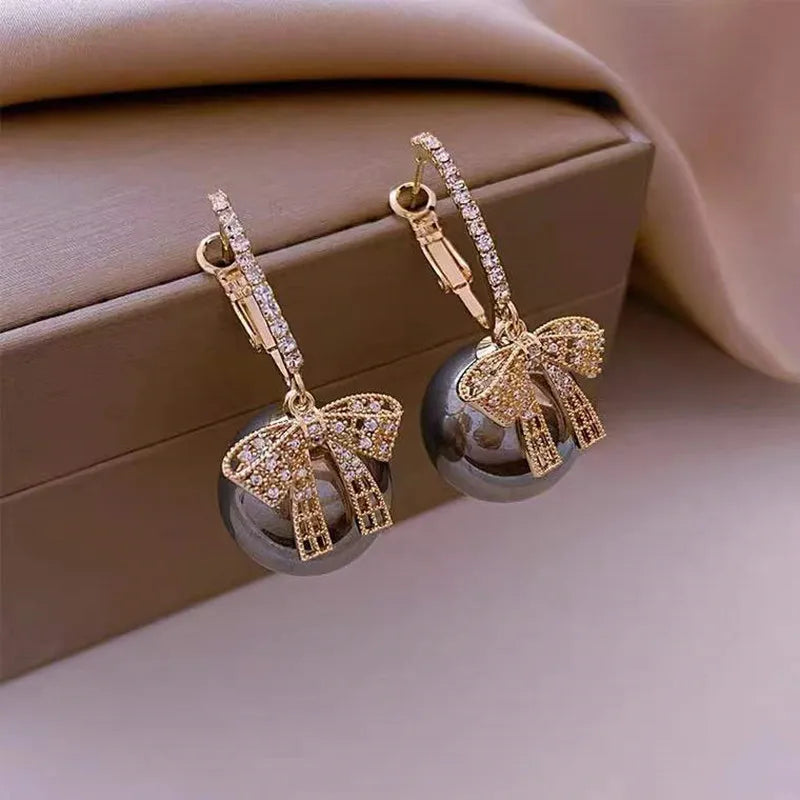 CHRISTMAS PEARL AND BOW EARRINGS-GRAY-State of Style