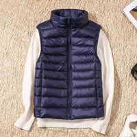 Light quilted vest with a feminine fit – Juliette-Dark blue-S-State of Style