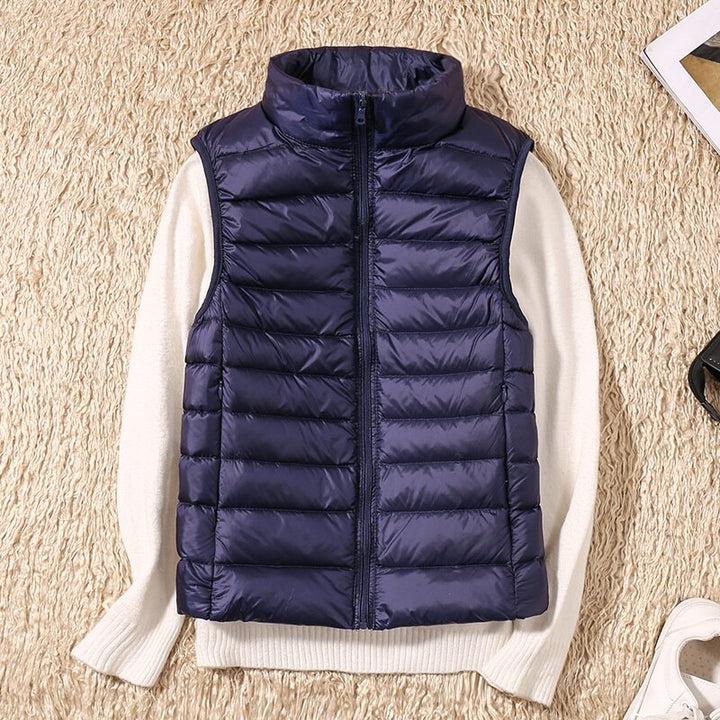 Light quilted vest with a feminine fit – Juliette-Dark blue-S-State of Style
