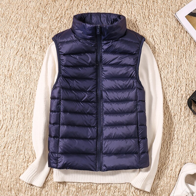 Light quilted vest with a feminine fit – Juliette-Dark blue-S-State of Style