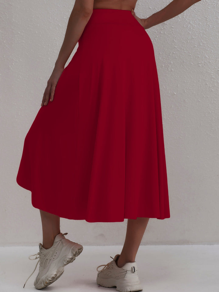 Sporty women's skirt with a high waistband & asymmetric cut – Alexia-Coral-S-State of Style