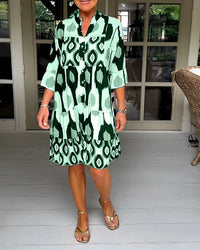 Trendy short-sleeved dress with abstract print & loose fit – Liora-Green-S-State of Style
