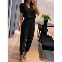 Trendy women's jumpsuit with short sleeves & wide legs – Alina-Black-S-State of Style