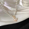 Elegance in Flight Pearl Necklace