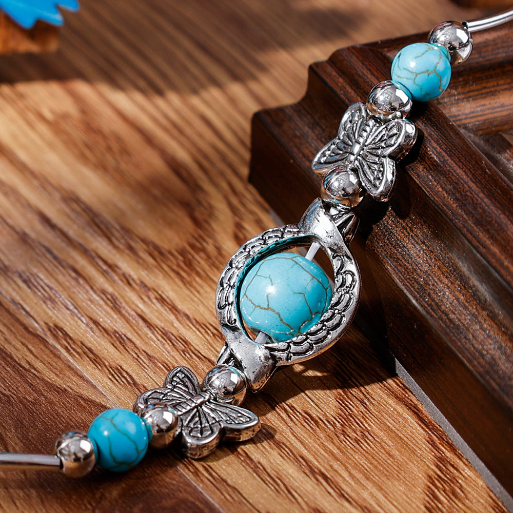 BUTTERFLY AND TURQUOISE BEAD BRACELET