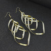 Golden Spiral Earrings | Unique Statement Jewellery