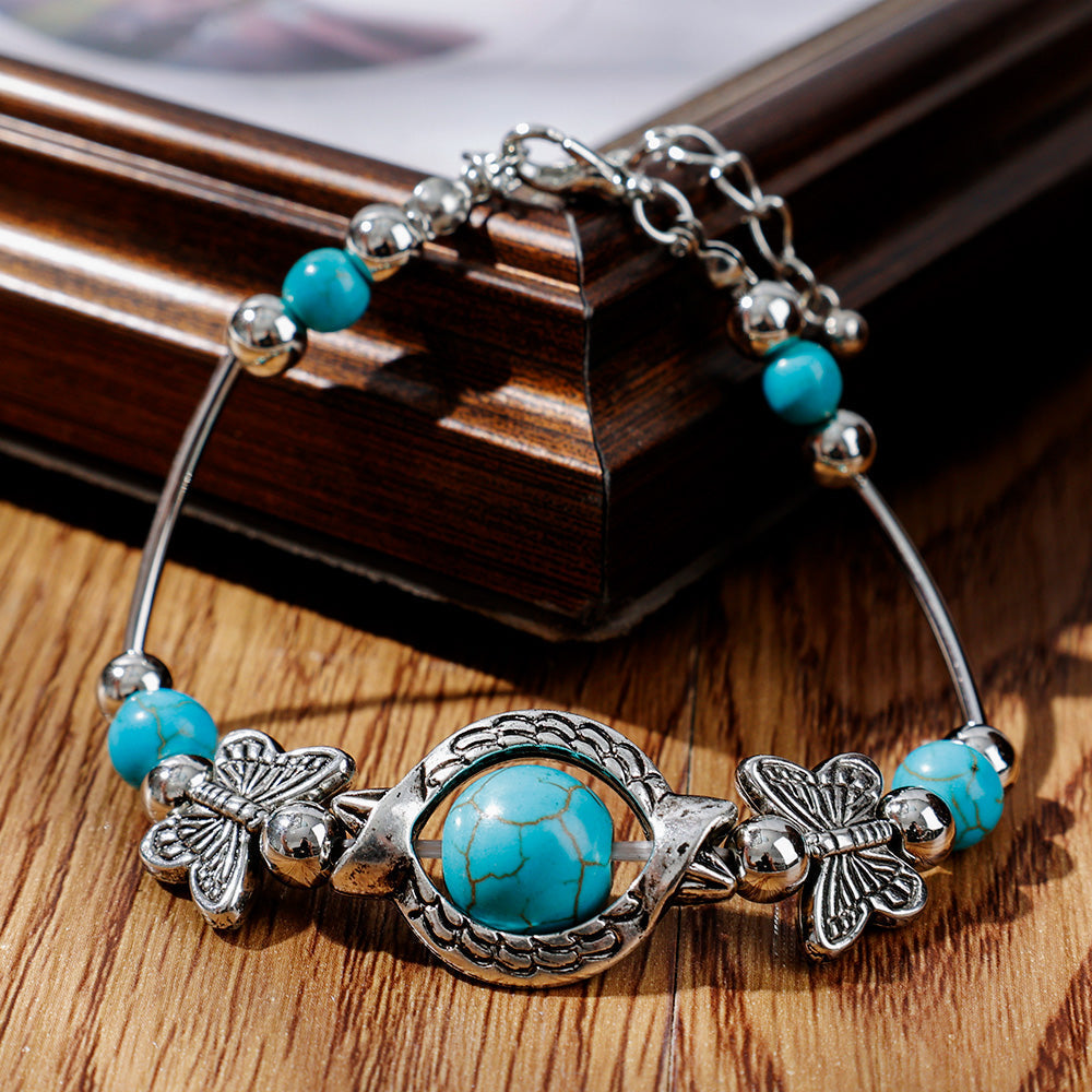 BUTTERFLY AND TURQUOISE BEAD BRACELET