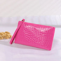 Fashionista's Crocodile Wristlet Bag