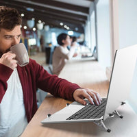 Adjustable Laptop Stand – Foldable Cooling Notebook Mount for Office & Travel – Orvane