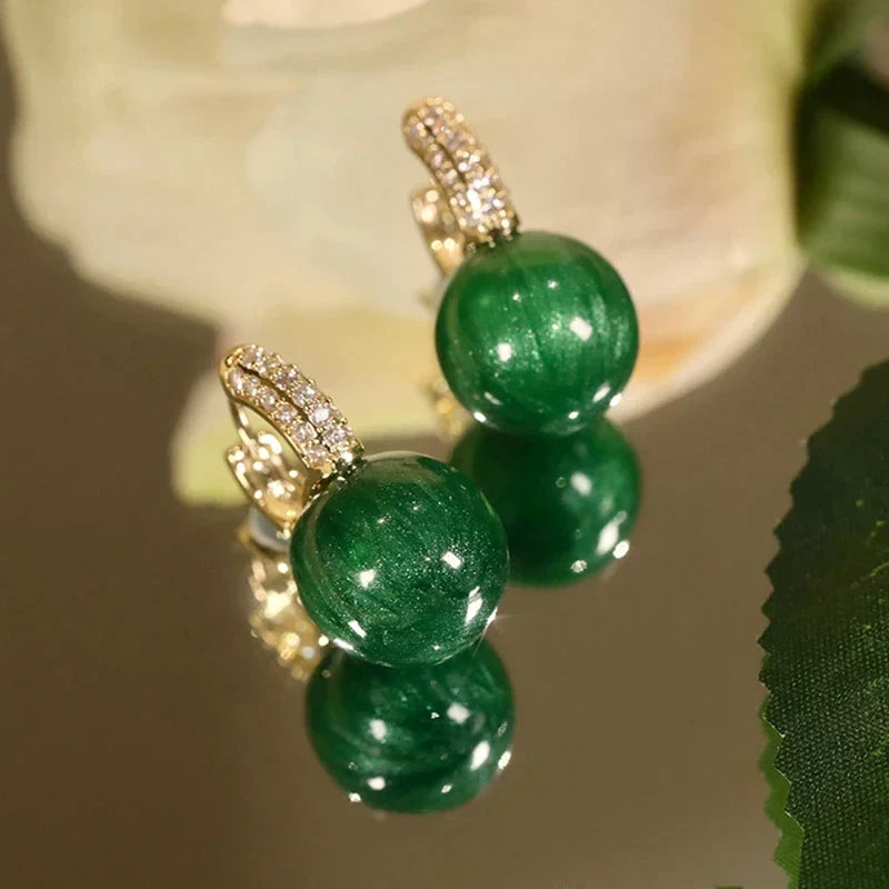 Elegant Luxury Earrings with Green Pearls