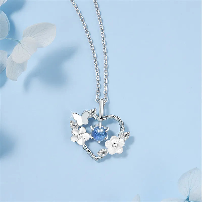 SILVER SEASHELL FLOWER HEART NECKLACE