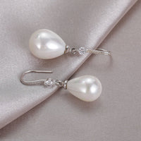 Elegant White Oval Pearl Earrings-State of Style