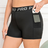 Plus Size CurveFit High-Waisted Biker Shorts-Black with Sheer Pocket-2XL-State of Style