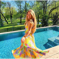 Printed Summer Dress with Deep Neckline and Bow Detail – Vivienne-S-State of Style