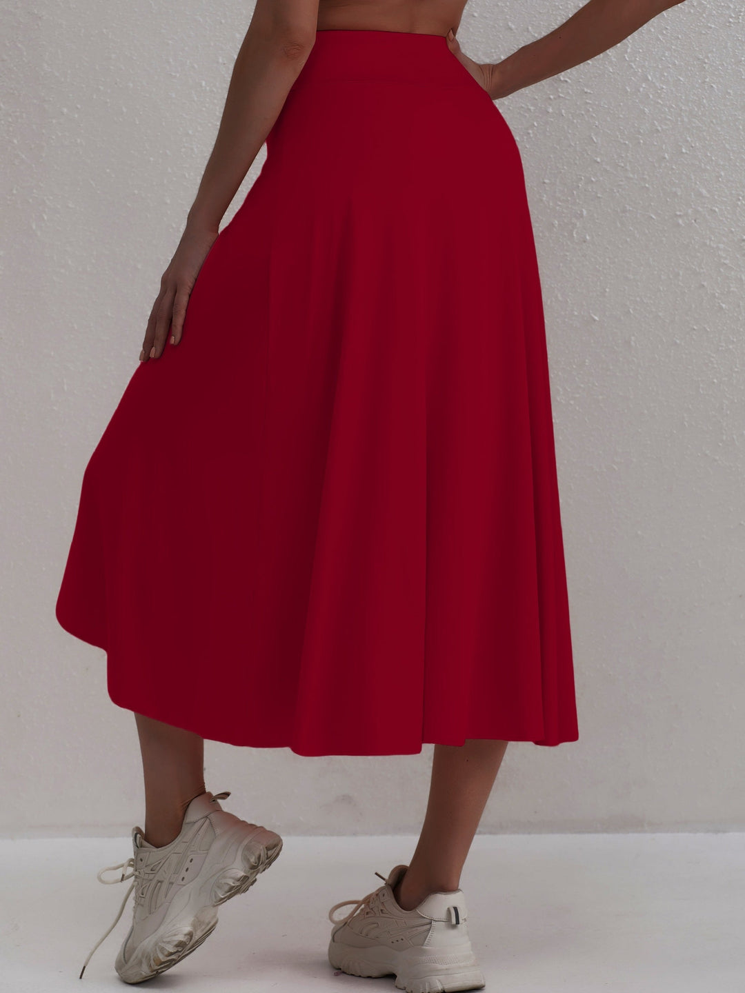 Sporty women's skirt with a high waistband & asymmetric cut – Alexia-Coral-S-State of Style