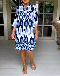 Trendy short-sleeved dress with abstract print & loose fit – Liora-Blue-S-State of Style